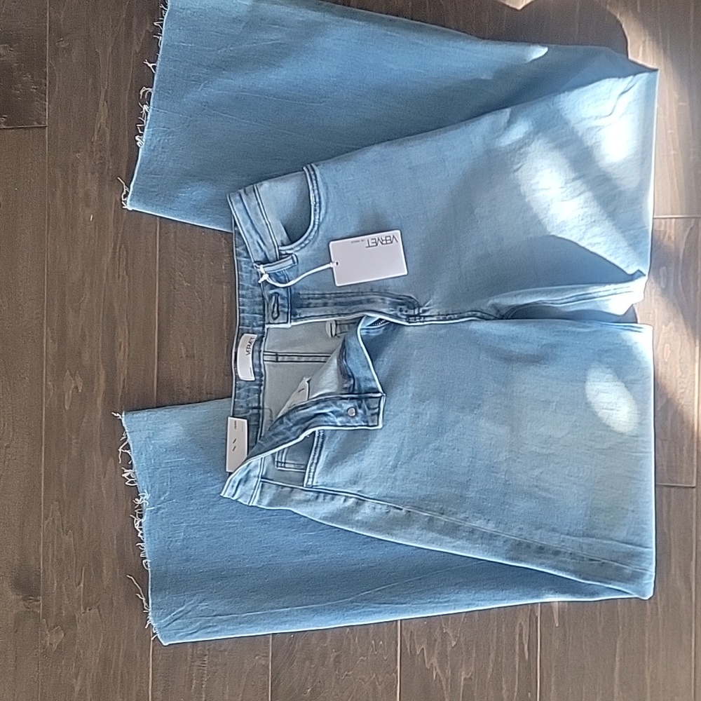 High rise, raw hem, wide leg jeans